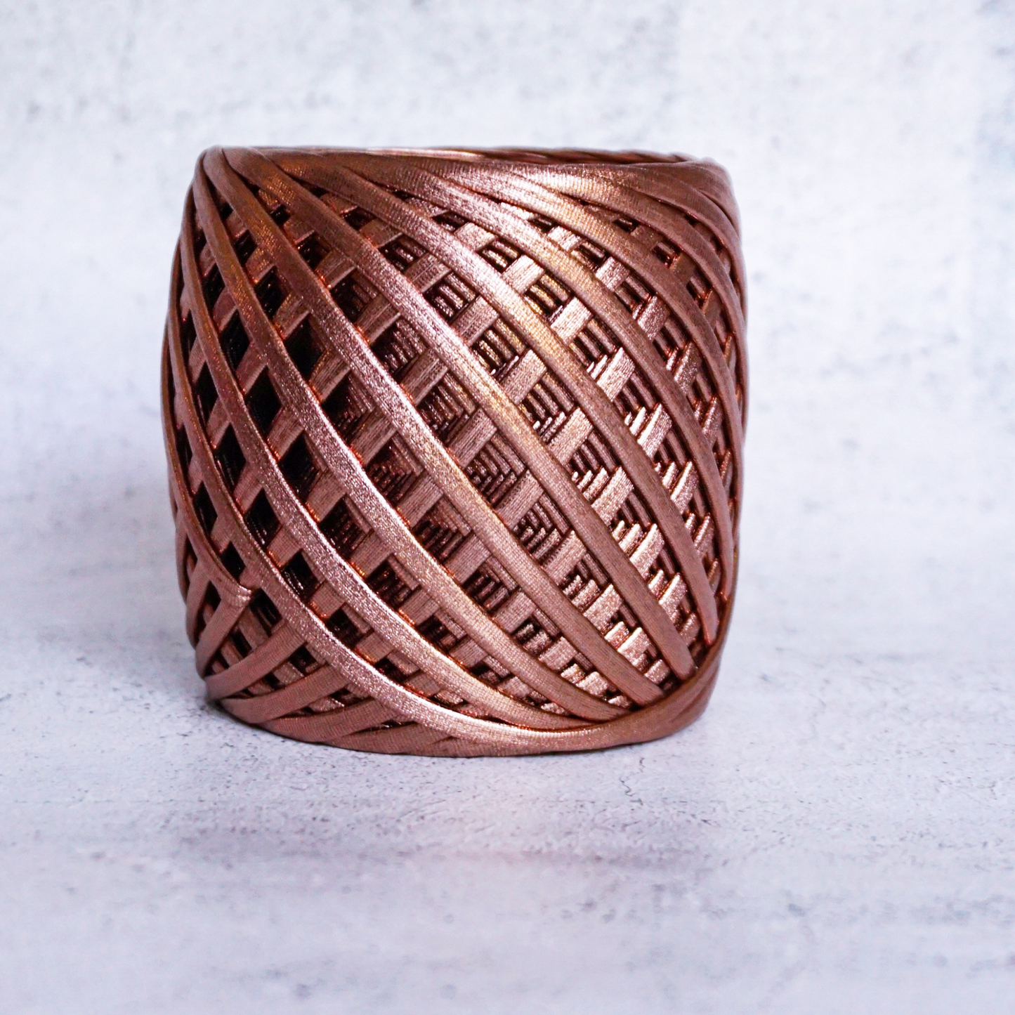 Metallic T-shirt yarn for crocheting baskets, bags, rugs and home decor.