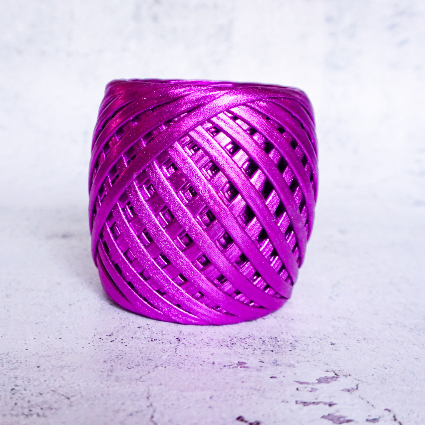 Metallic T-shirt yarn for crocheting baskets, bags, rugs and home decor.