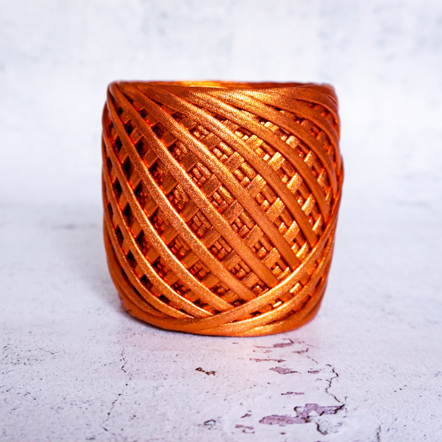 Metallic T-shirt yarn for crocheting baskets, bags, rugs and home decor.