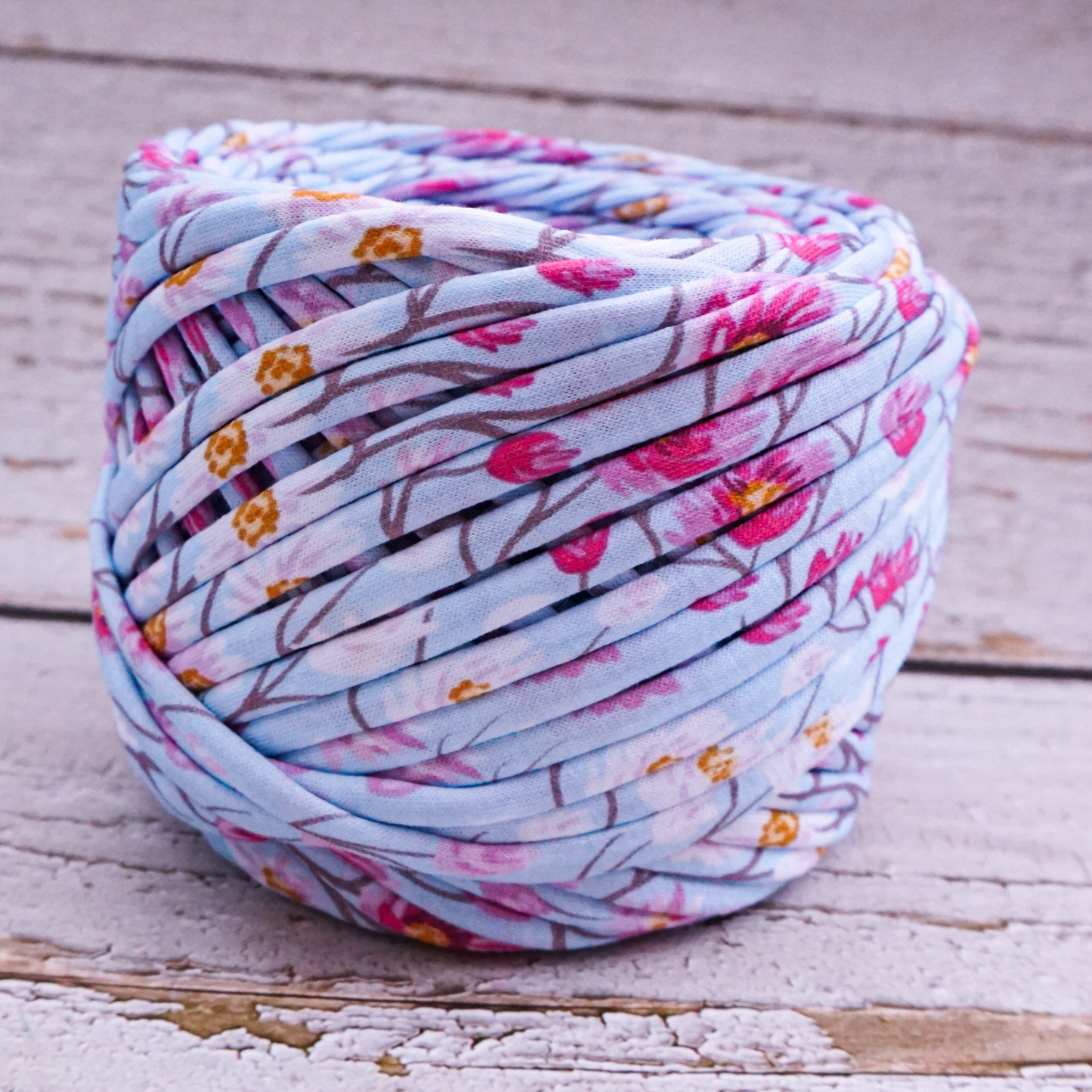 T-shirt yarn for crocheting baskets, bags, rugs and home decor. Flower print