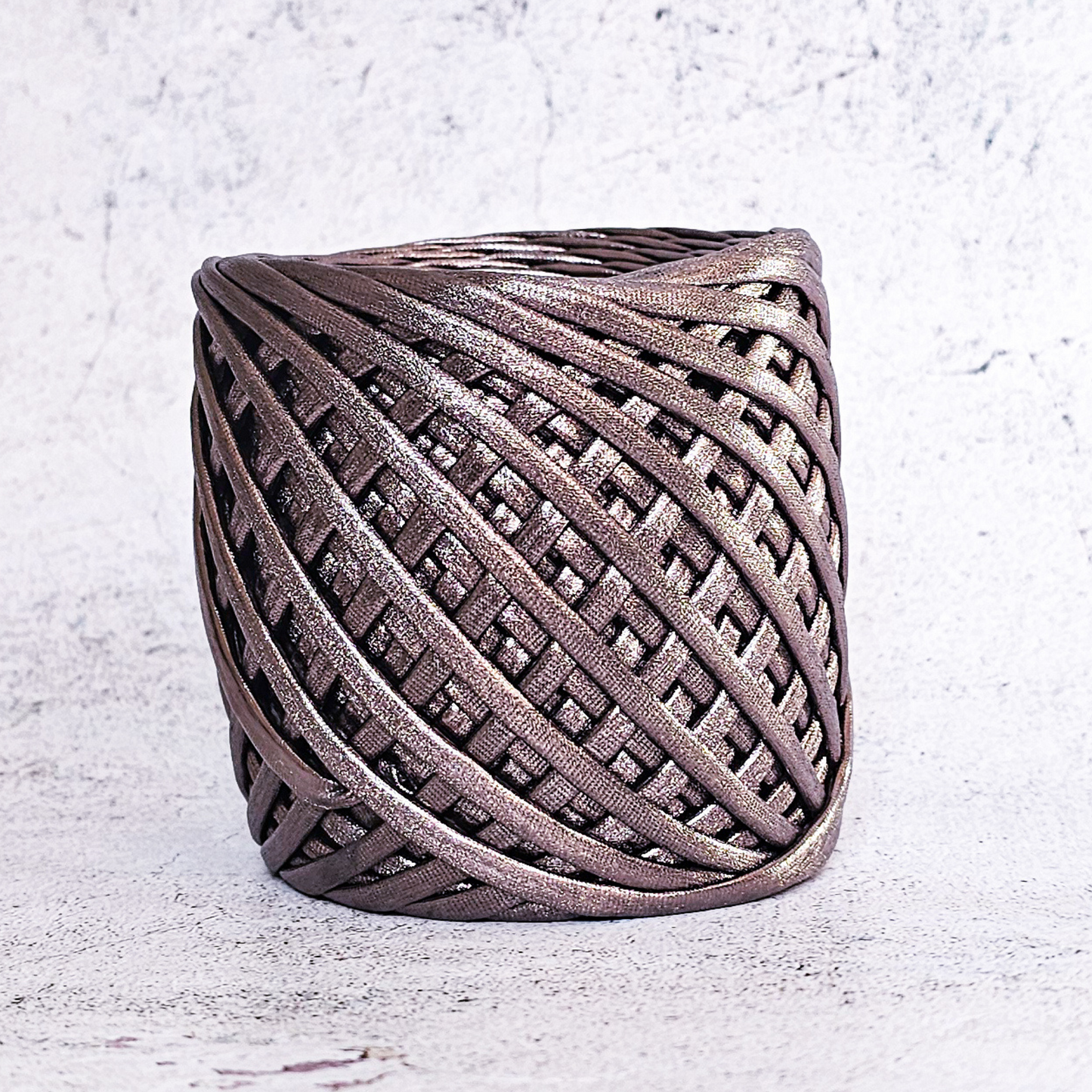 Metallic T-shirt yarn for crocheting baskets, bags, rugs and home decor.