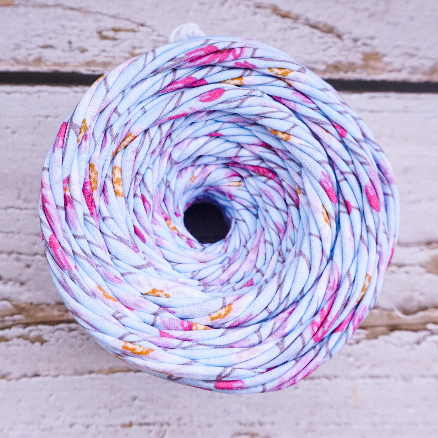 T-shirt yarn for crocheting baskets, bags, rugs and home decor. Flower print