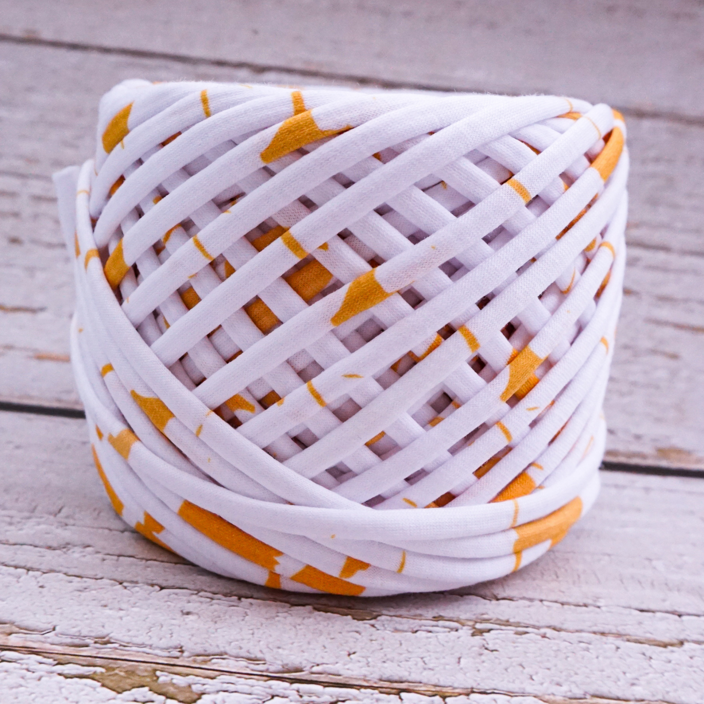 T-shirt yarn for crocheting baskets, bags, rugs and home decor. White with gold strokes