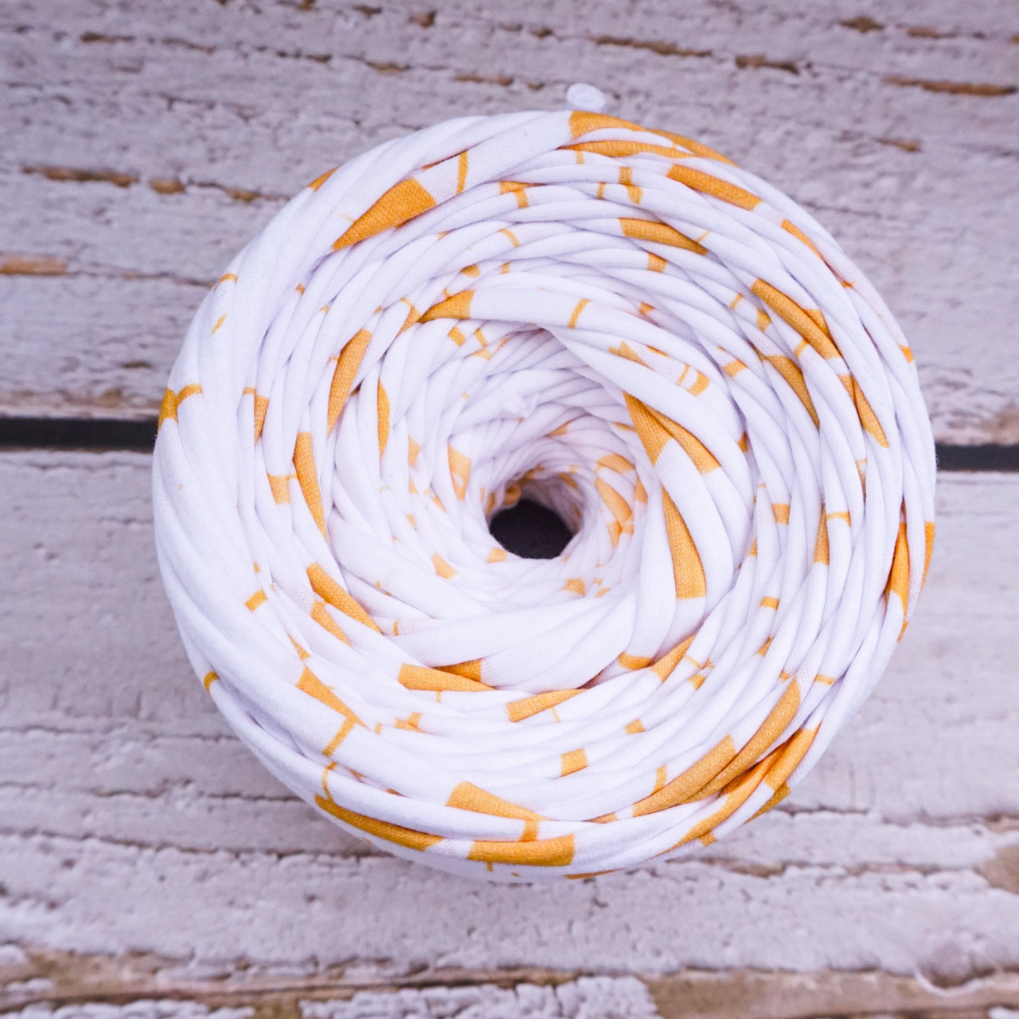 T-shirt yarn for crocheting baskets, bags, rugs and home decor. White with gold strokes