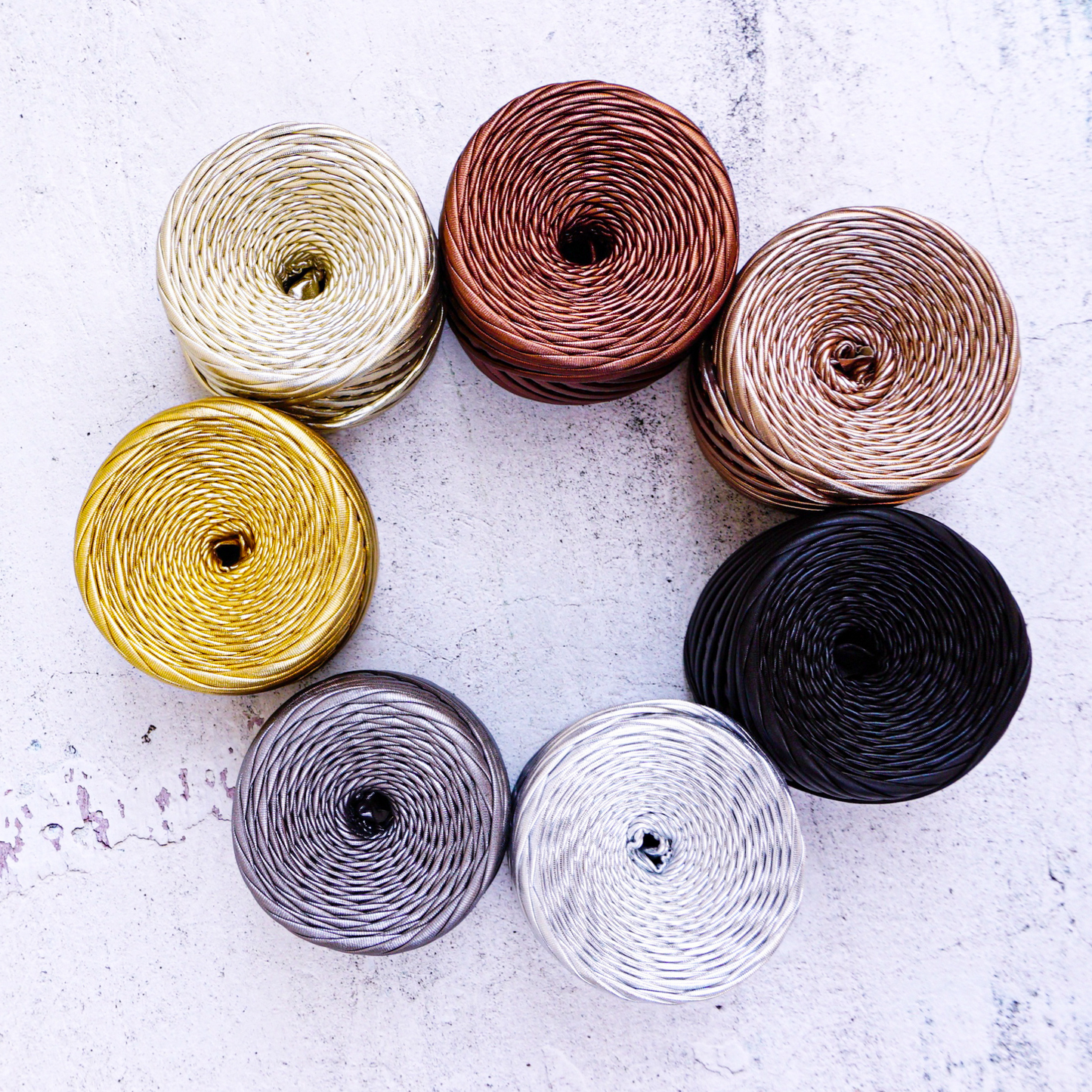 Metallic T-shirt yarn for crocheting baskets, bags, rugs and home decor.